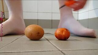 Foot play in pantyhose with fruit - porn video