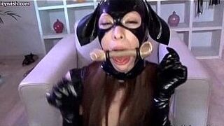 Asian shemale in latex gets rubbed - porn video